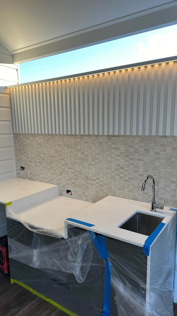 Splashback and pool area completed for