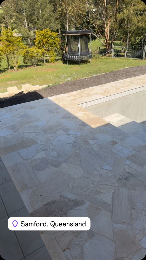 ☀️ “Crazy Pave pool surrounds all done! Now just waiting on the pebble Crete to be installed and the fence…